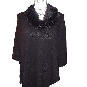 Steve Madden Faux fur women’s poncho with fringe edge